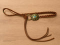 Treccia in vera pelle con pietra